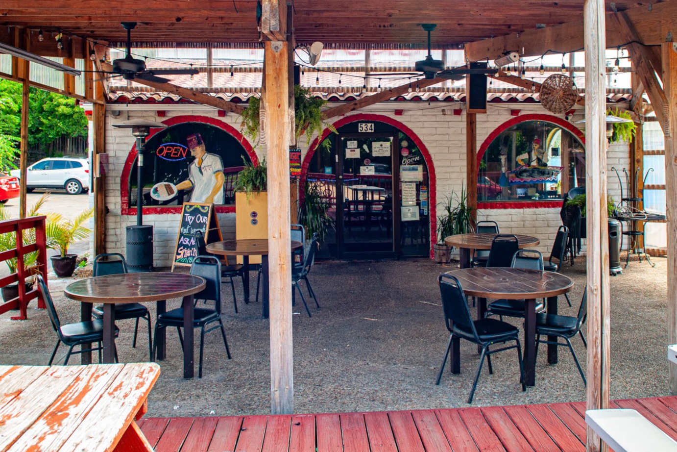 Exterior, roofed patio seating area